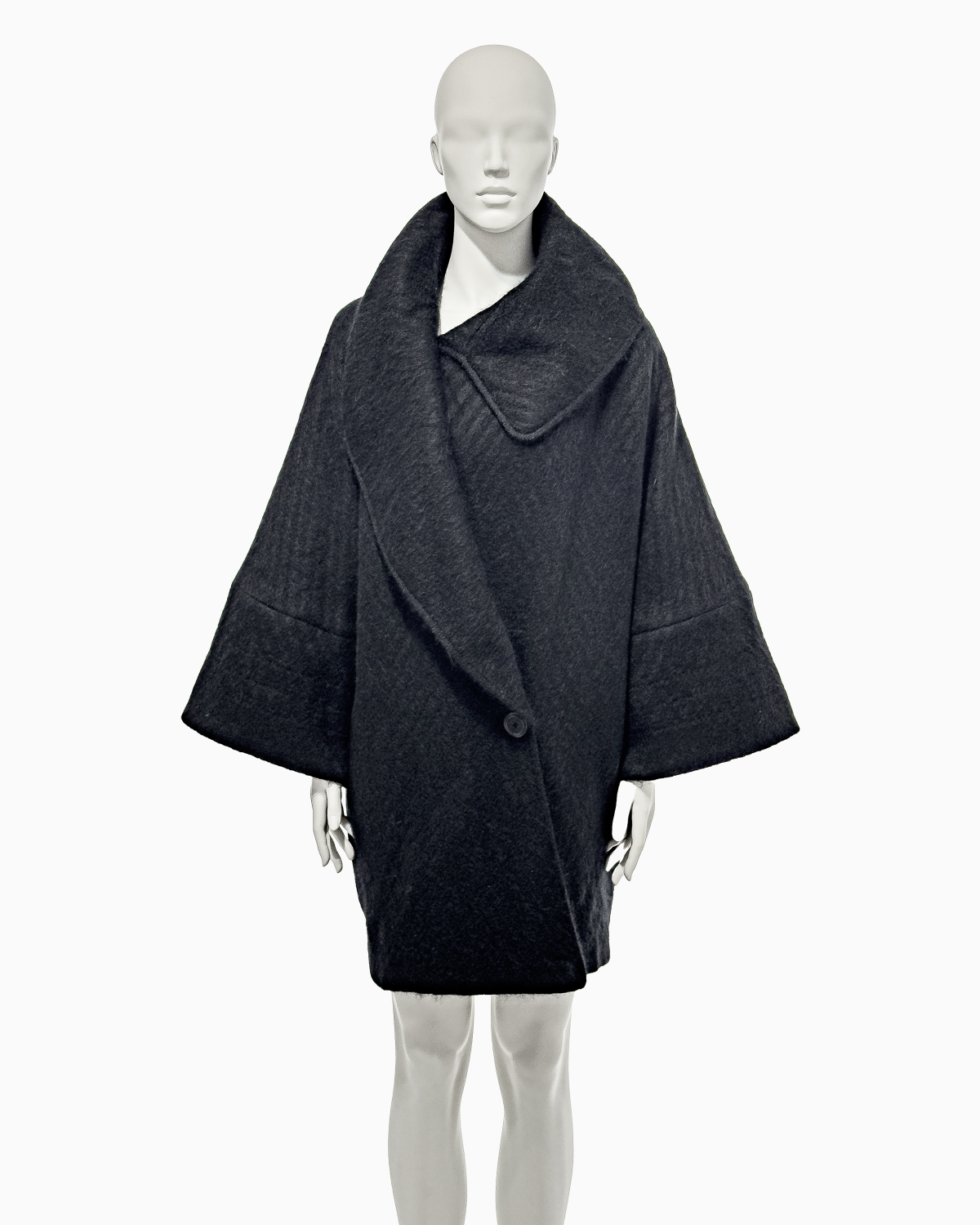 John Galliano Black Mohair Cacoon Coat with Māori Motifs, Fall/Winter 1999 "Māori"
