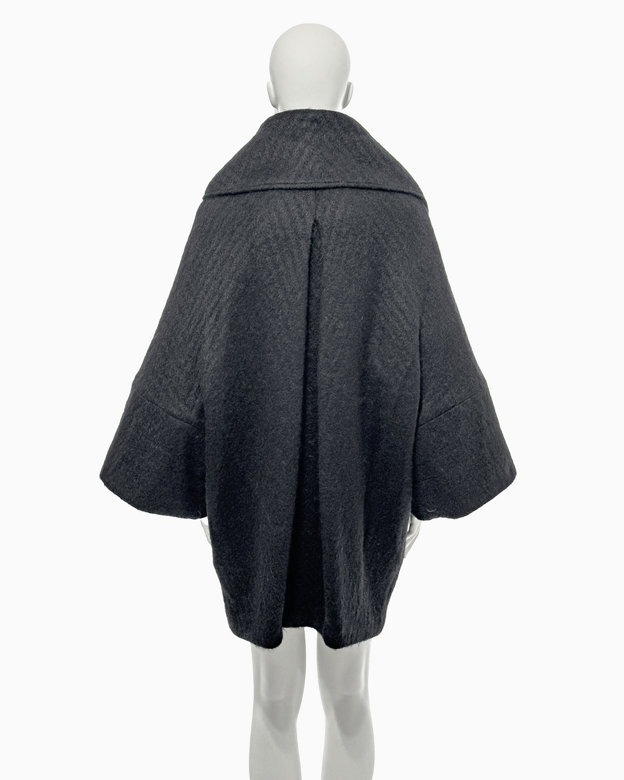 John Galliano Black Mohair Cacoon Coat with Māori Motifs, Fall/Winter 1999 "Māori"